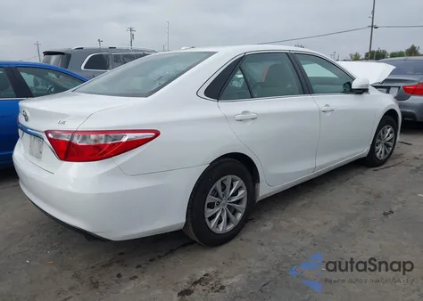 2015 Toyota Camry Le z USA, uszkodzony, nr VIN 4T4BF1FK7FR470759